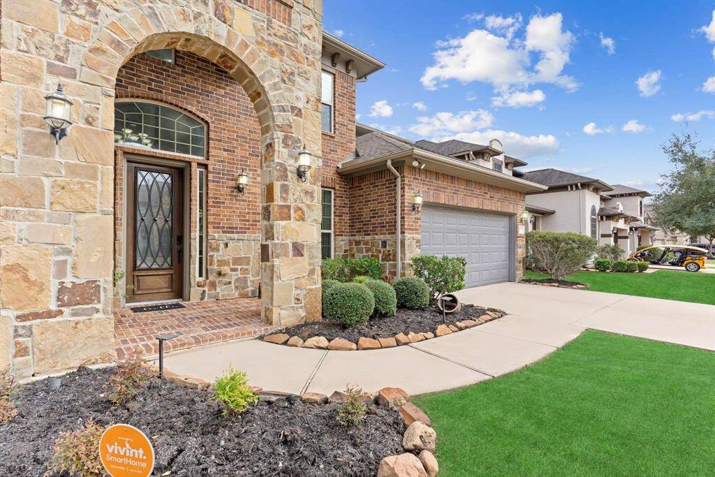 Step through the tall, stunning Mahogany Lead Glass Door with an elegant Iron Grill and begin creating unforgettable memories today!