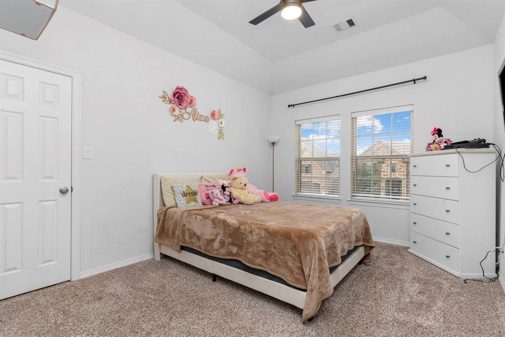 All the guest bedrooms feature spacious walk-in closets, with this particular bedroom offering its own private vanity area for added comfort and convenience!