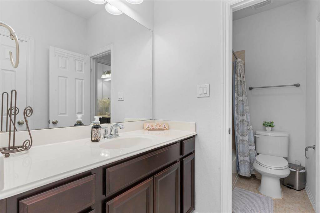 The Guest Bedroom with private vanity is wonderful for that teenager in your household!