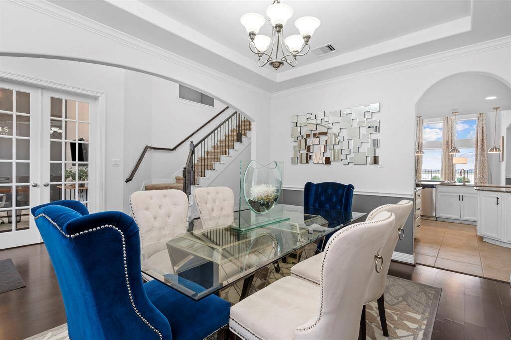 Enjoy this magnificent view through the tall French glass panel doors that open into your study, creating a bright and inviting space!