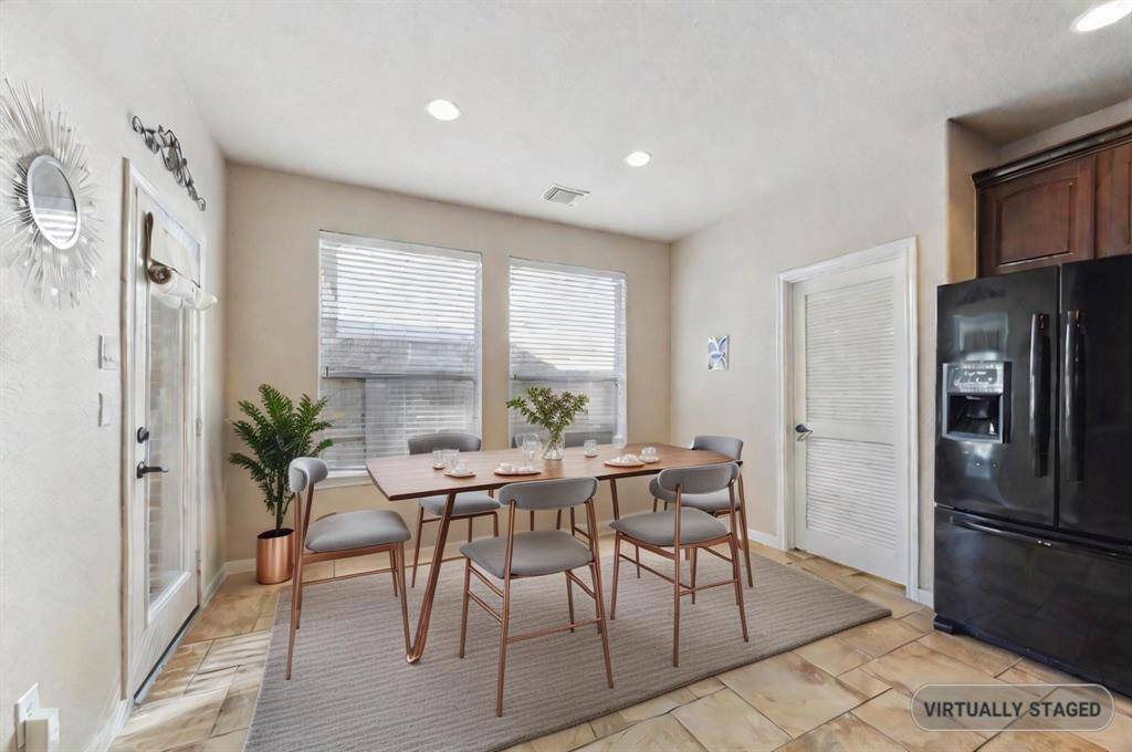 * Staged. Spacious Breakfast room perfect for those busy morning's quick bite.