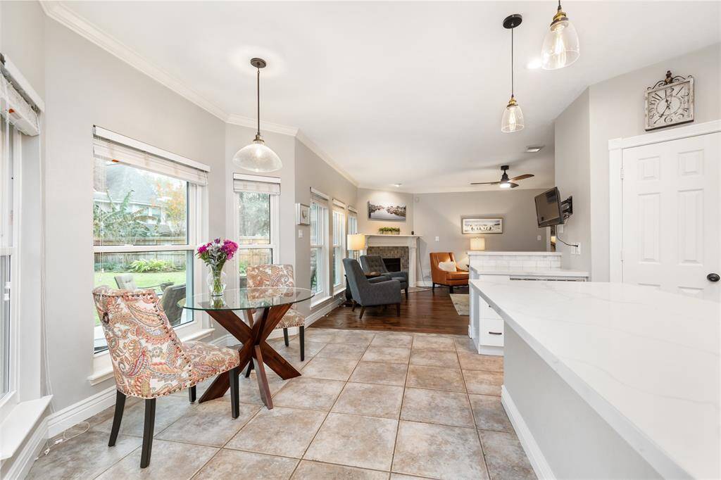 The corner of the Kitchen is occupied by the impressive gas range and matching hood