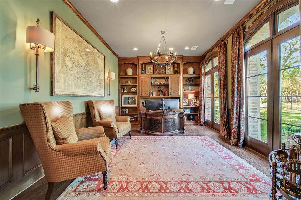 Dedicated office space with ample built-in storage and gorgeous windows.