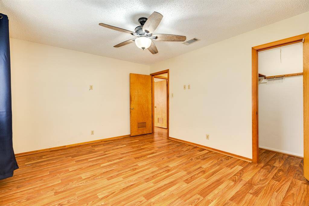 bedroom 2 showing entrance and open closet