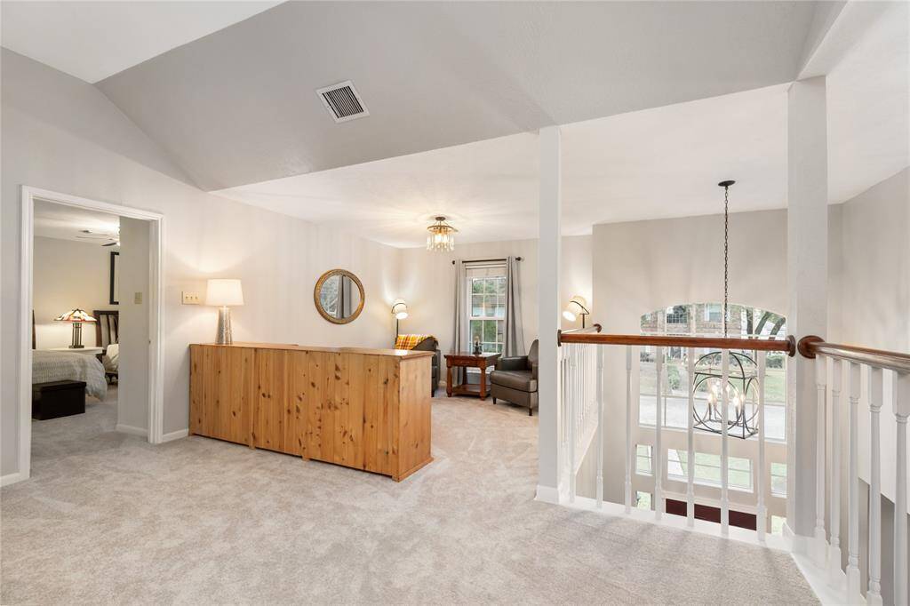 Create a cozy sitting area or play space on the other end of the Game Room