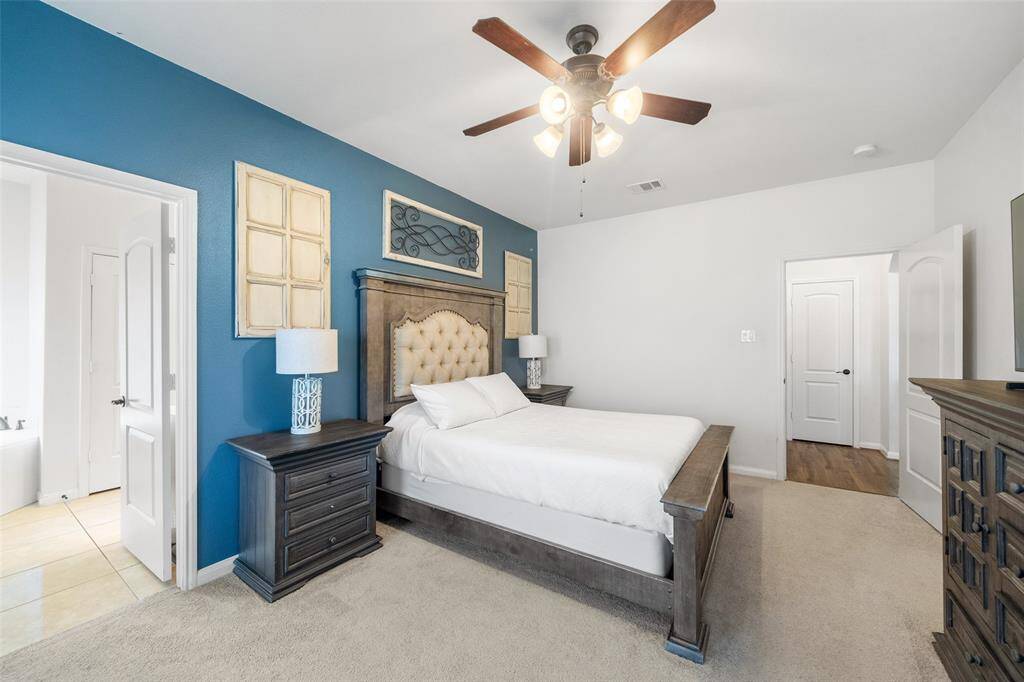 Primary bathroom with an amazing double vanity and walk in shower!