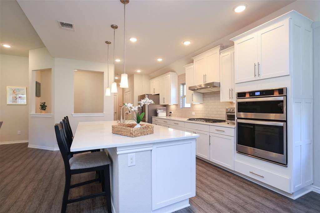 oven and microwave feature and 5 burner gas cooktop