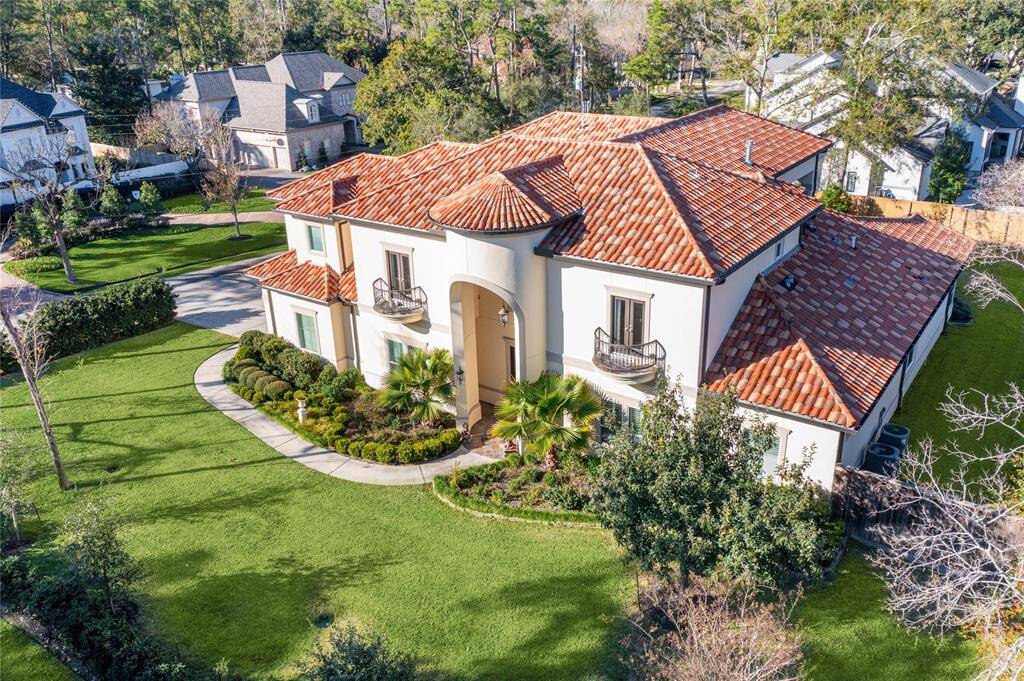 Introducing an exquisite Mediterranean-style home with stunning tile roof, nestled in a lush, landscaped setting. This elegant home offers luxurious living with spacious interiors and a grand entrance, perfect for those seeking comfort and sophistication. A must-see for discerning buyers!
