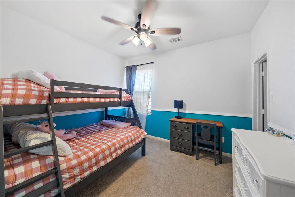 The third bedroom features lots of space and a large window!