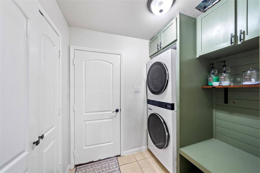 The utility room has a stacked washer and dryer for your convenience!