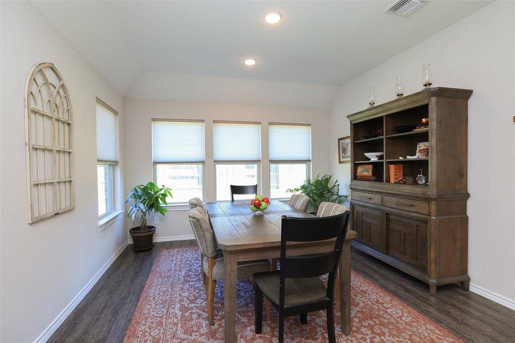 Huge breakfast and dining area measures 15 x 12 with loads of windows