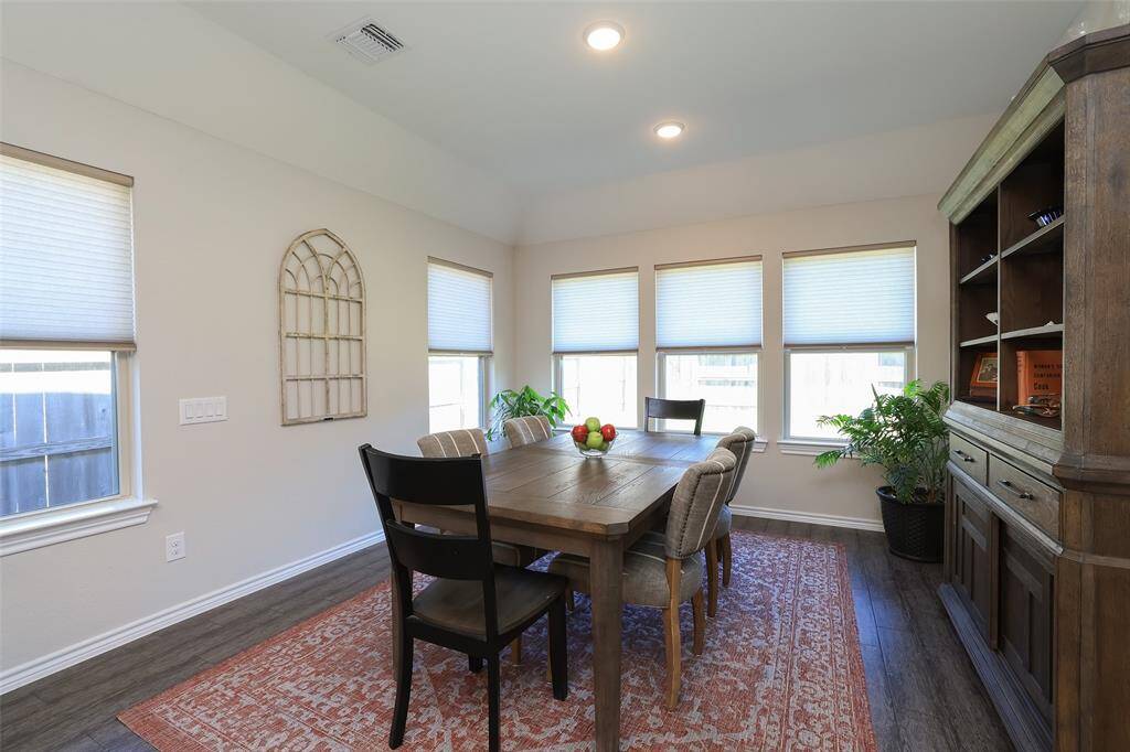 Many different configurations would work in this area. Maybe a sunroom and dining?