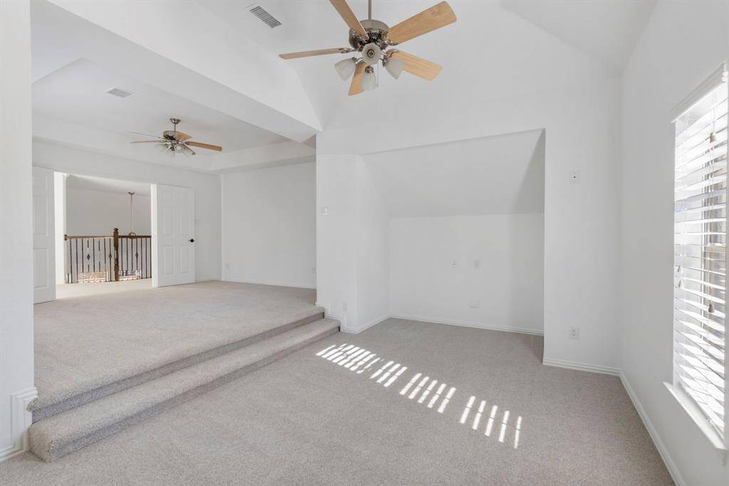 Bright, spacious game room and flex space that effortlessly adapts to your lifestyle. Natural light pours in, illuminating the open layout—perfect for creativity or relaxation. A blank canvas for your dream setup!