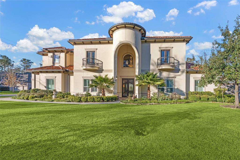 Mediterranean-style home with elegant architecture and lush landscaping. Enjoy spacious interiors, beautiful balconies, and a welcoming grand entrance.