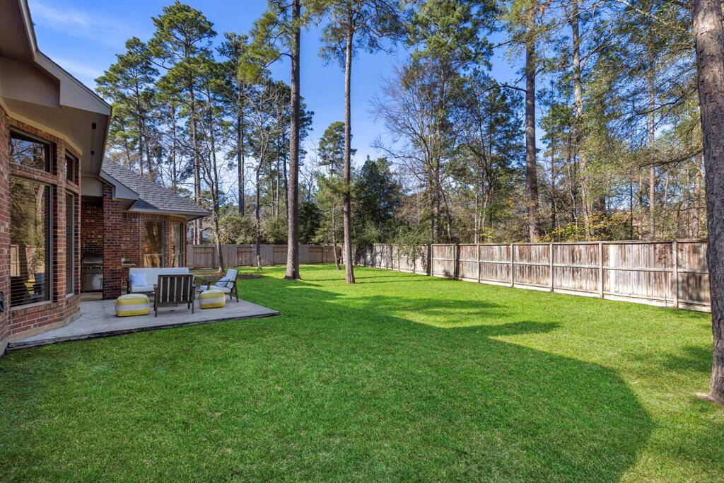Serene backyard escape with lush lawn and cozy patio are the perfect backdrop to your dream pool.