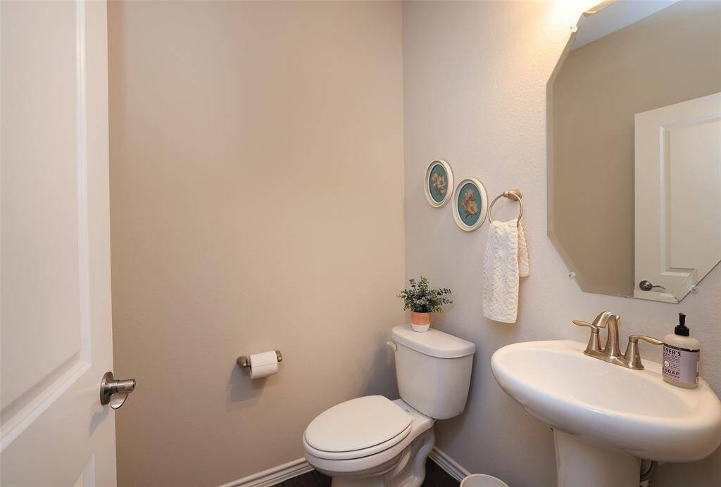 Powder bath near stairway