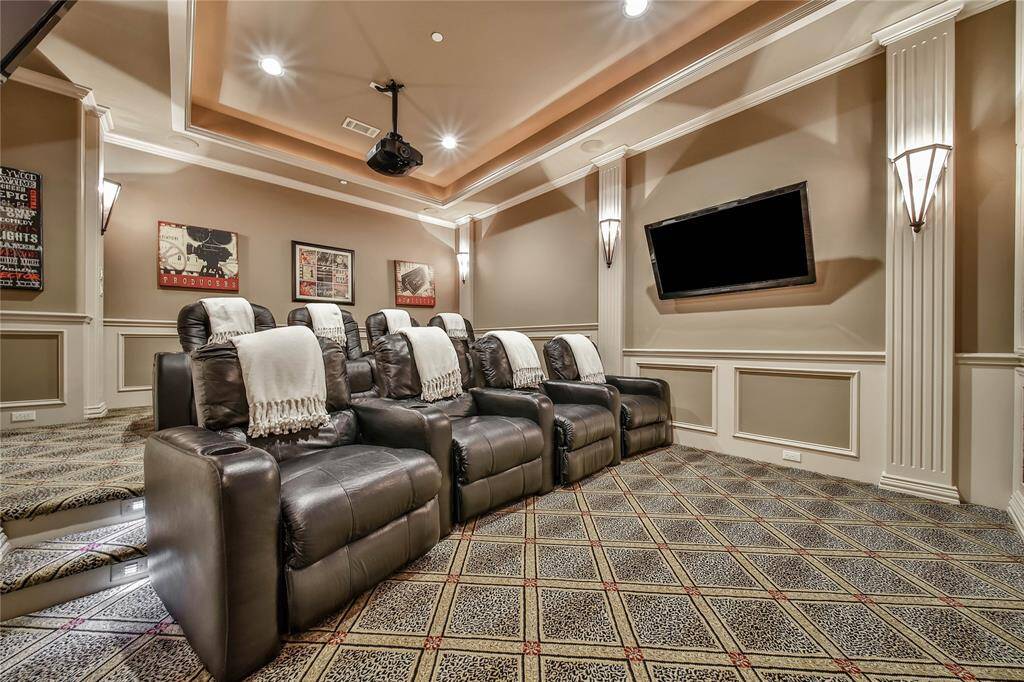 This theater room is an entertainer's dream with comfortable seating for family and friends.