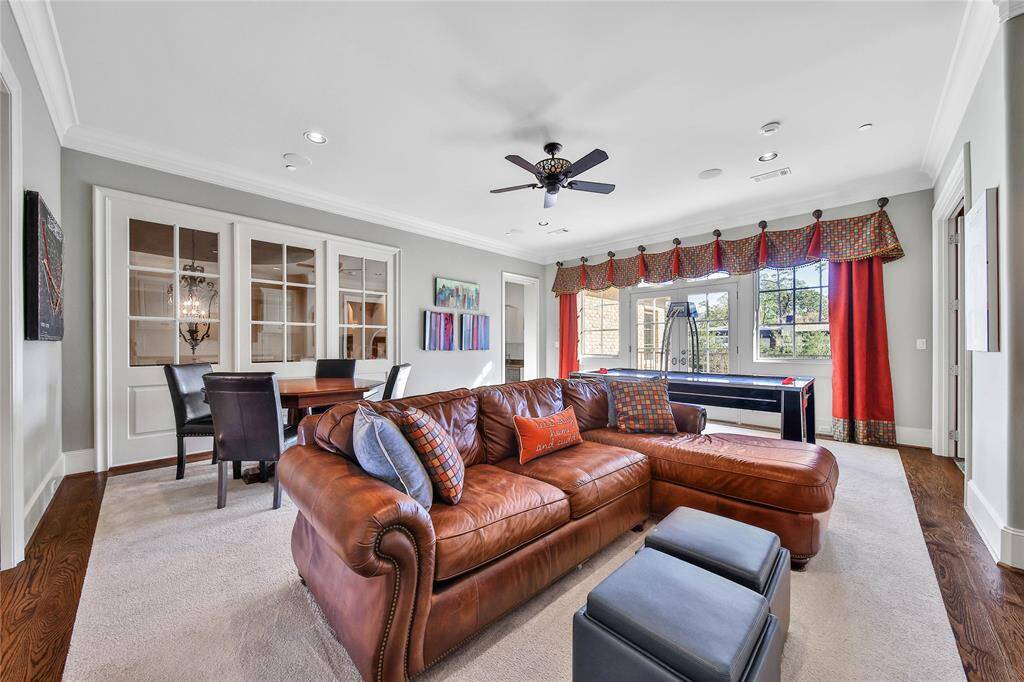 The game room is filled with abundant natural light, perfect for entertainment.