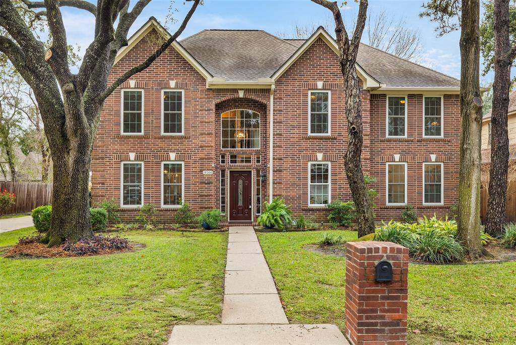 This stunning home is situated in the distinctive Olde Oaks community