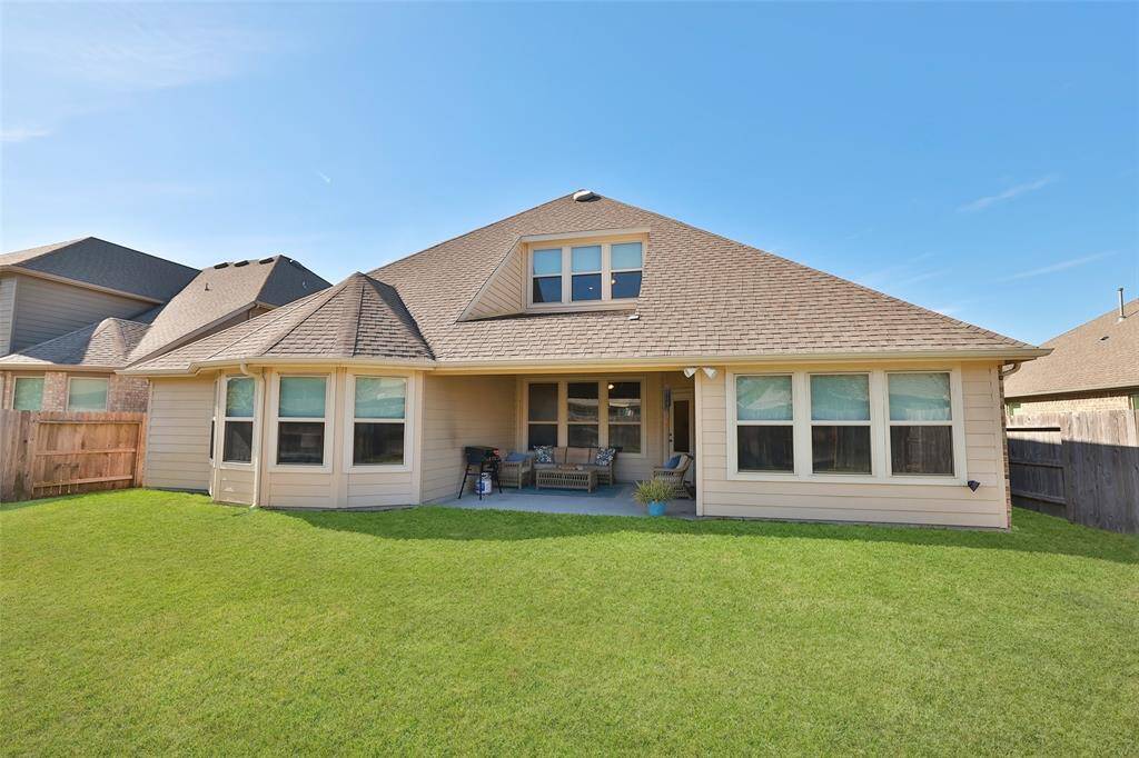 Sprinklers. Upper windows are the game room