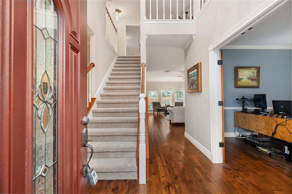 Greet guests in the home's foyer