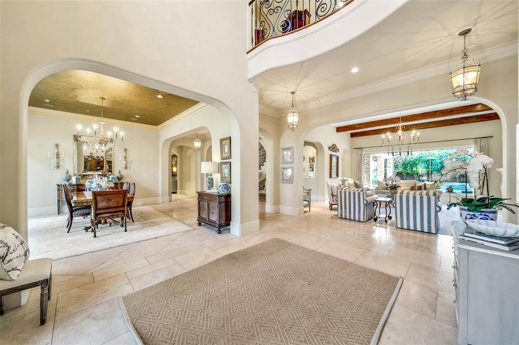 Elegant entrance with soaring ceilings.