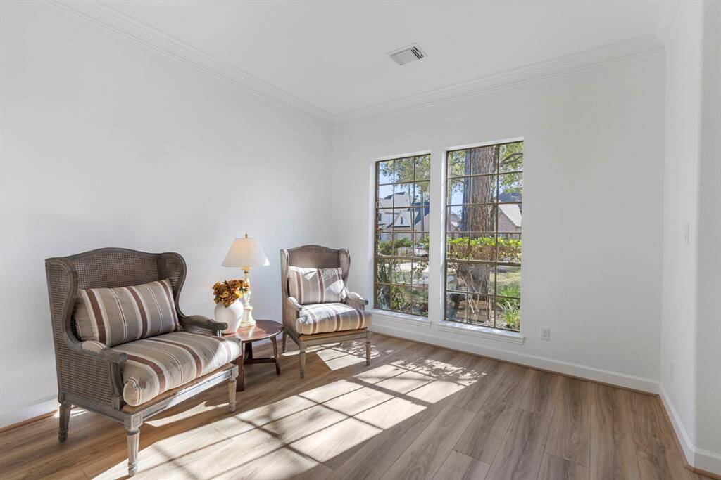 Cozy sunlit room perfect for morning coffee or afternoon reading in style.