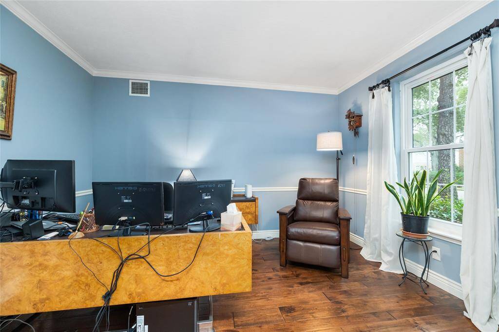 The Living Room features a cozy corner fireplace, perfect for chilly winter nights