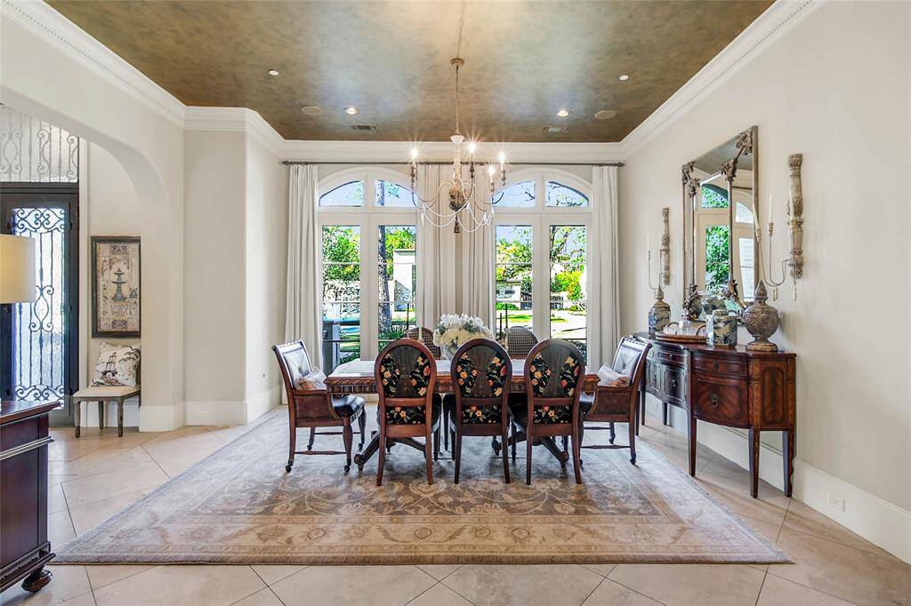 Formal dining space filled with natural light and gorgeous fixtures throughout.