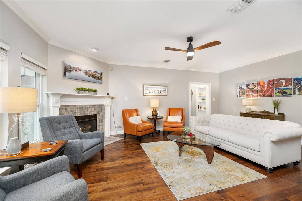 This gorgeous Kitchen is a chef's dream, with stainless steel appliances, wide cabinets, and a convenient island for additional counter and storage space.