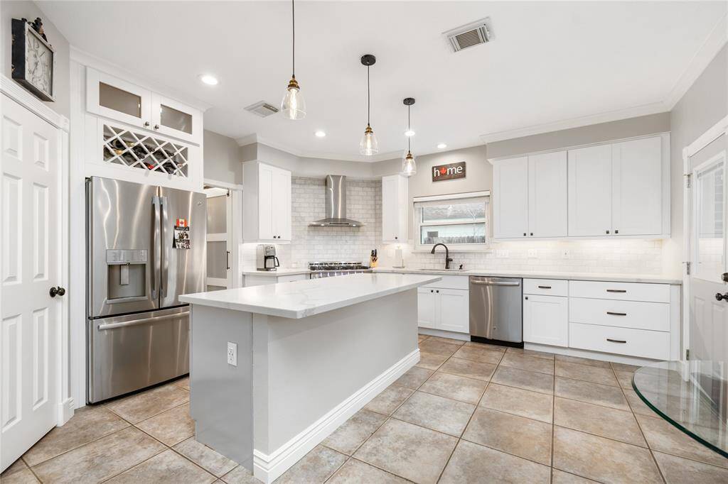 The Breakfast Nook and island provide space for casual dining