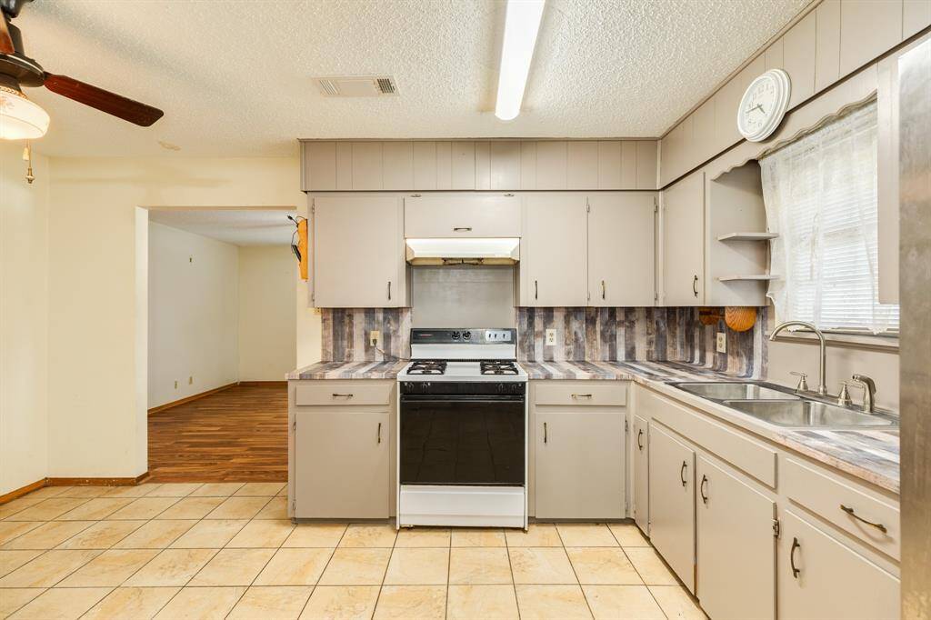 Kitchen from dining room window above sink