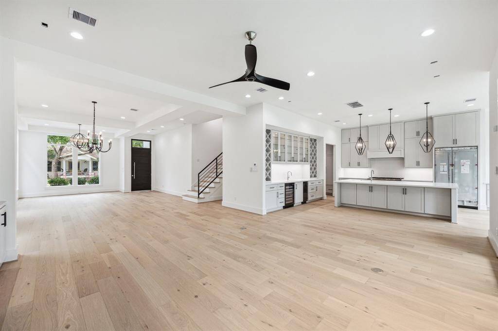 View from the Family Room towards the kitchen and Formal Dining Room.