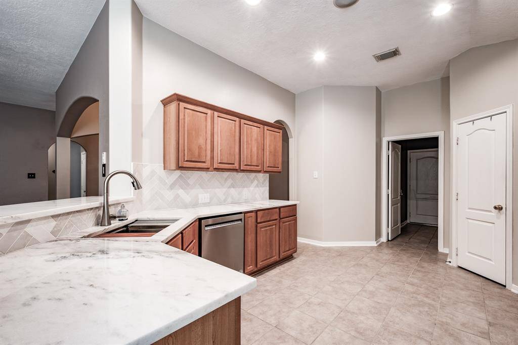 Kitchen with new granite countertops
