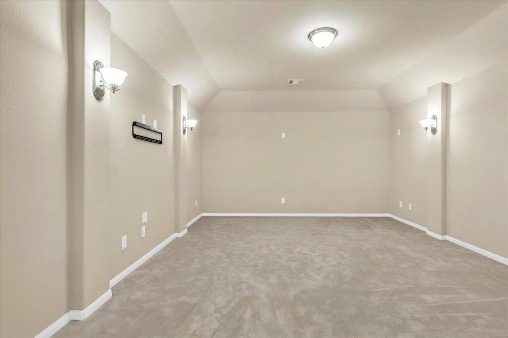 Enjoy movie night in your own theatre / media room that is complete with sconce lighting!