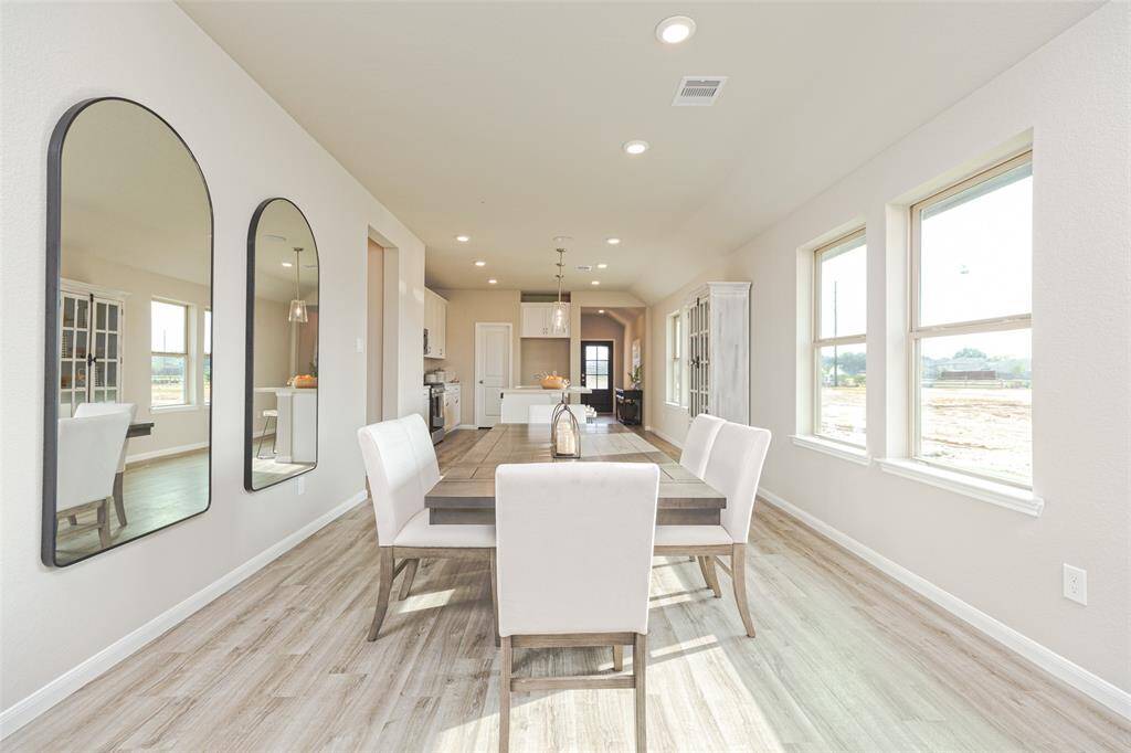 Sample photo of completed home with similar plan. As-built colors and selections may vary.