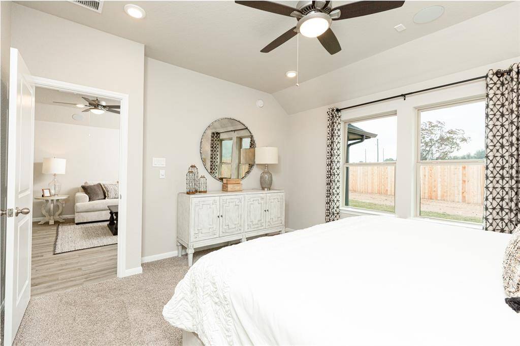 Sample photo of completed home with similar plan. As-built colors and selections may vary.