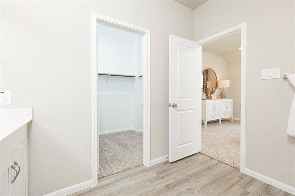 Sample photo of completed home with similar plan. As-built colors and selections may vary.