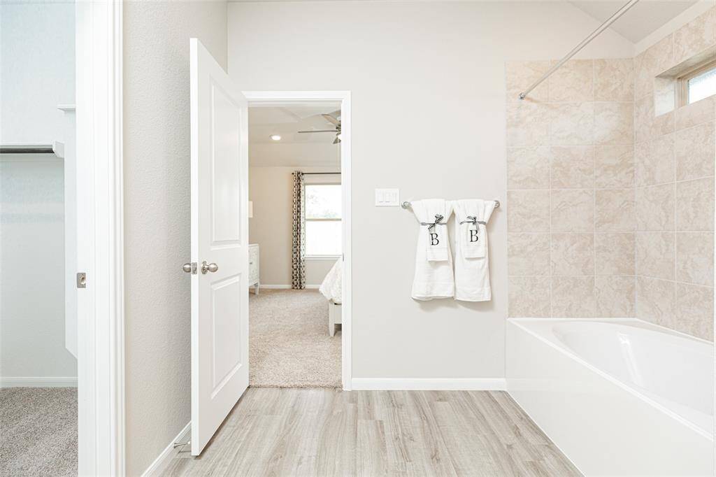 Sample photo of completed home with similar plan. As-built colors and selections may vary.