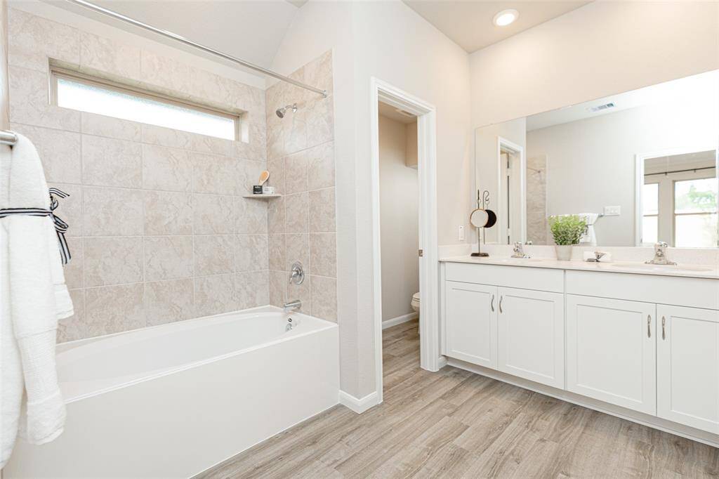 Sample photo of completed home with similar plan. As-built colors and selections may vary.