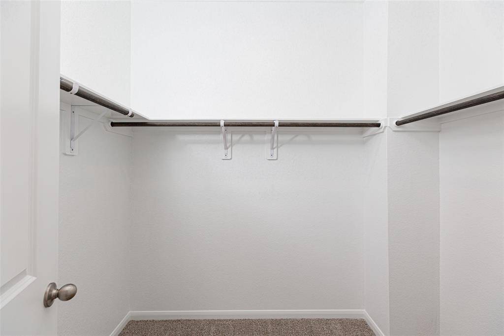 Sample photo of completed home with similar plan. As-built colors and selections may vary.