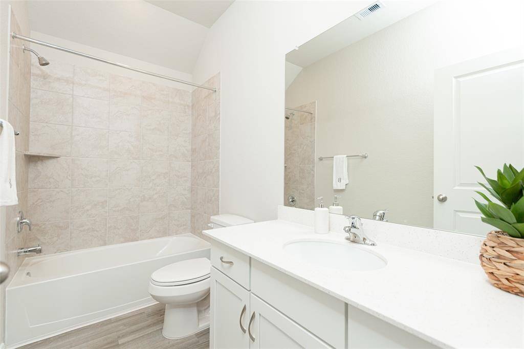 Sample photo of completed home with similar plan. As-built colors and selections may vary.