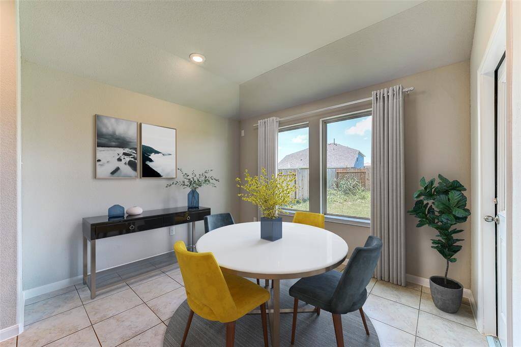Sample photo of completed home with similar plan. As-built color and selections may vary.