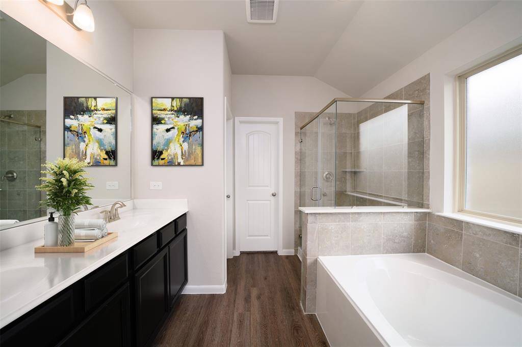 Sample photo of completed home with similar plan. As-built color and selections may vary.