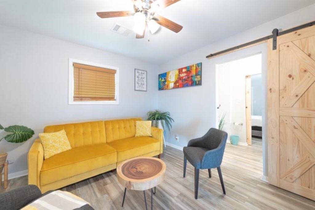 3rd bedroom can be converted into a second living room or office space (seen here).
