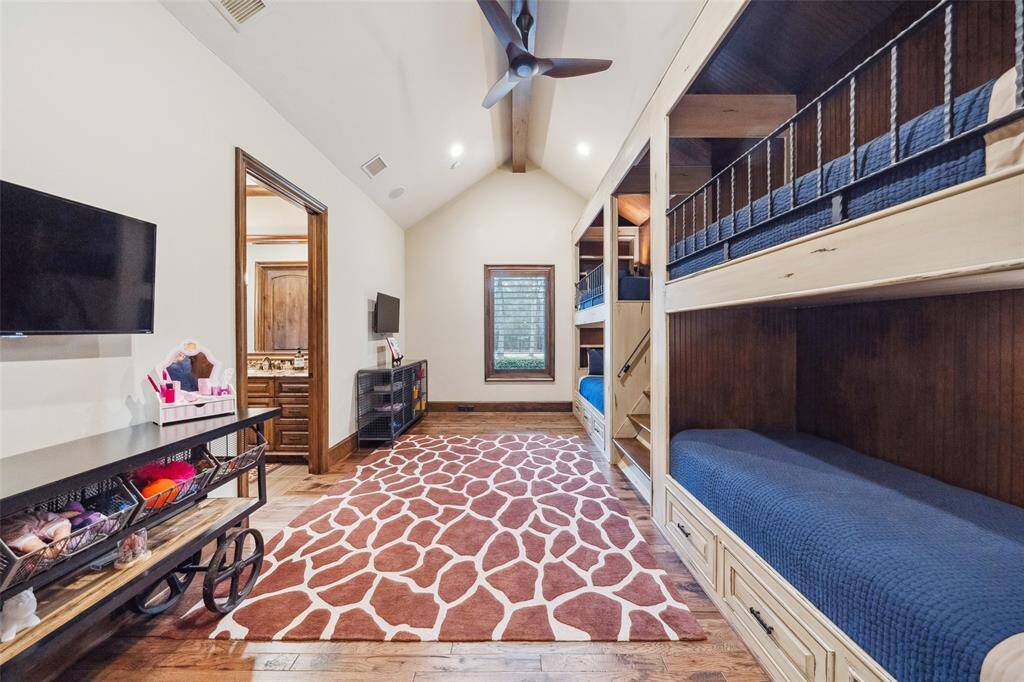 This secondary bedroom is any child's dream retreat and features built-in bunk beds with staircase for safe and easy access to the top bunks, walk-in closet and en-suite bathroom with bathtub.