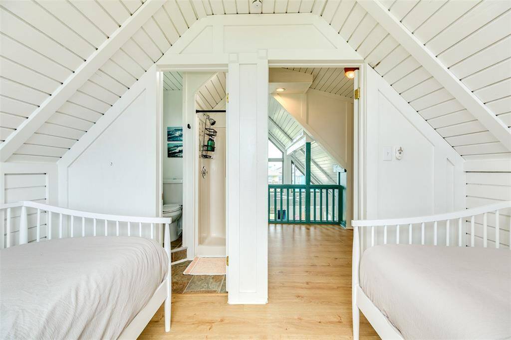 Cozy Retreat: This charming 3rd bedroom or 2nd  Primary, offers ample space for relaxation and comfort, with bright interiors and a convenient adjoining bathroom.