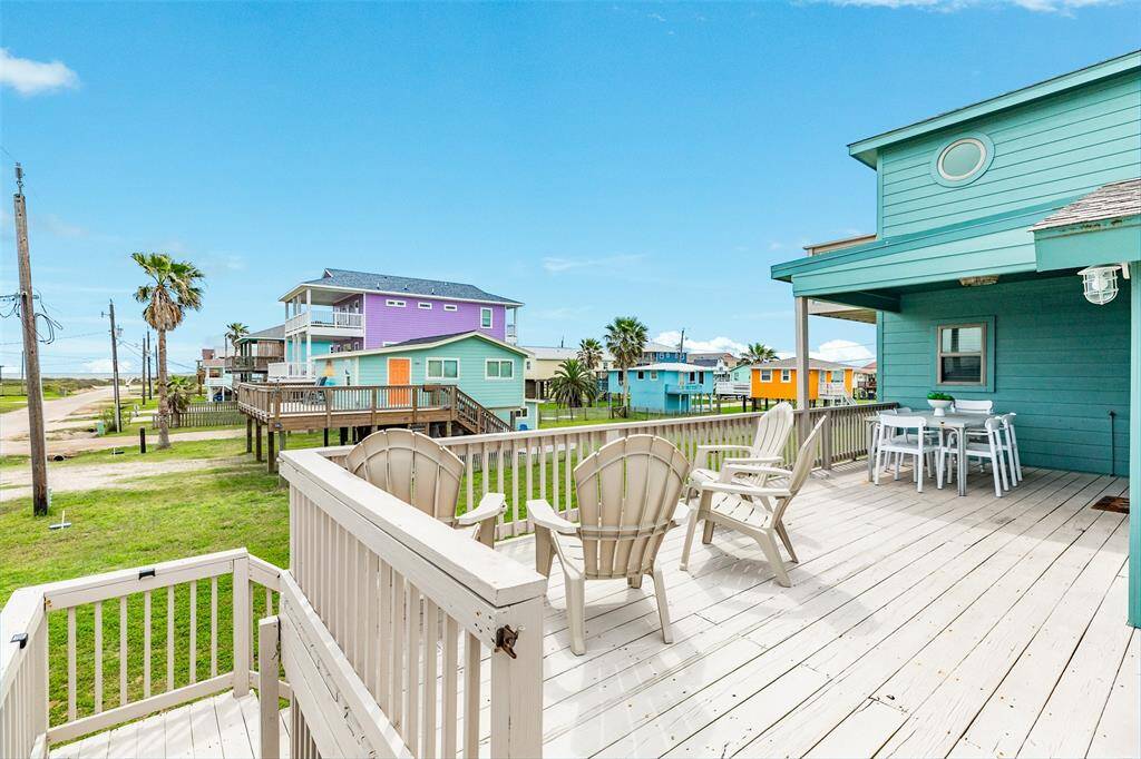 Charming deck with partial cover for versatile outdoor enjoyment.