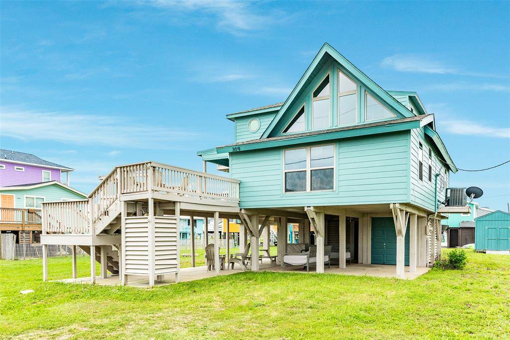 Experience versatile outdoor living with multiple inviting spaces for relaxation and entertainment.