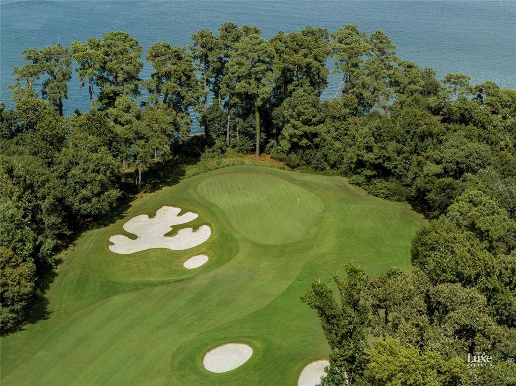 This home offers exclusive access to the prestigious Grand Pines Golf Course, a stunning 182-acre, 18-hole course inspired by legendary courses like Pinehurst and Pine Valley.